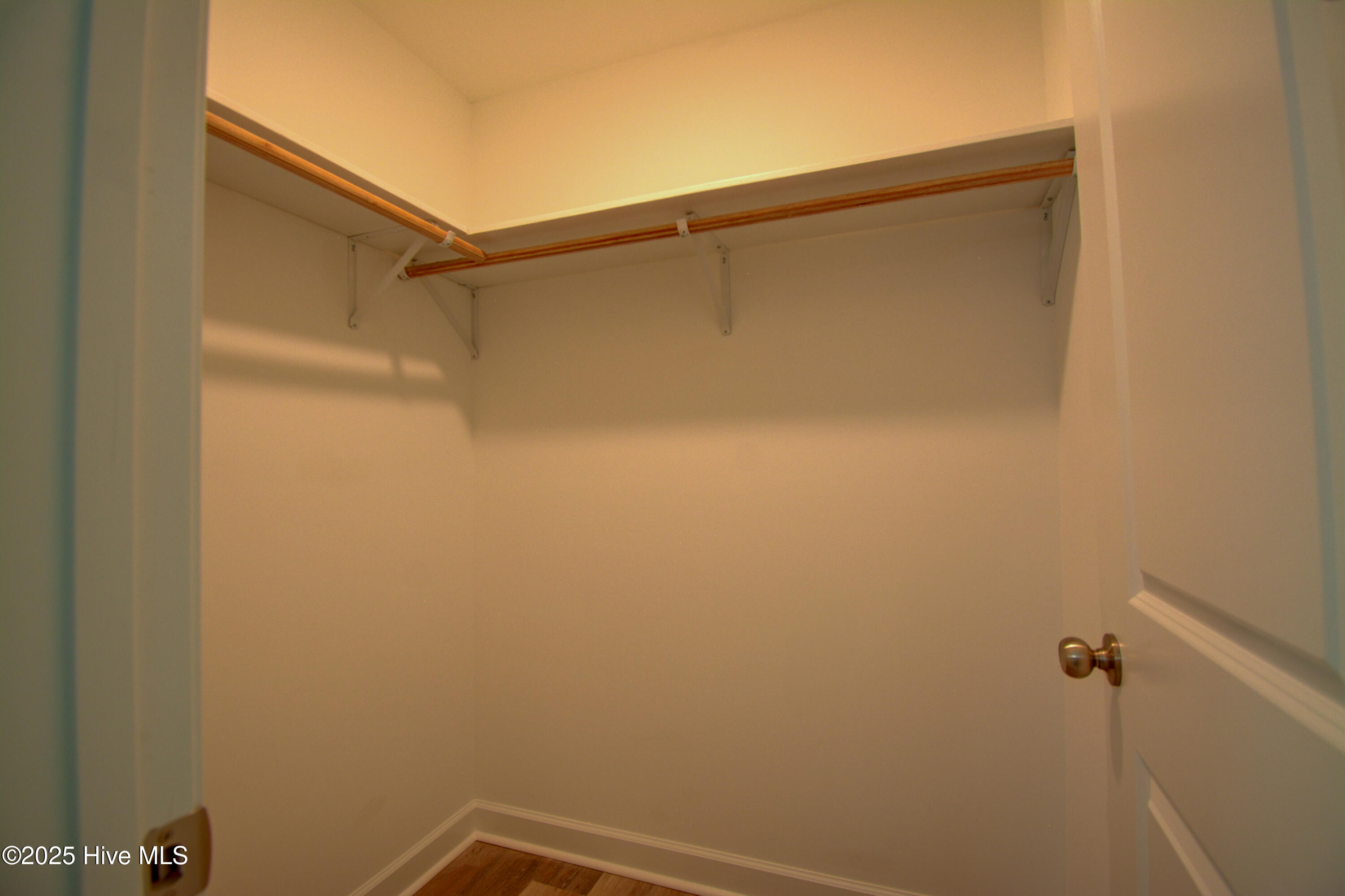 320 Belt Road Hampstead, NC 28443 - Photo 19 of 38 Walk-in closet off primary bedroom and bath
