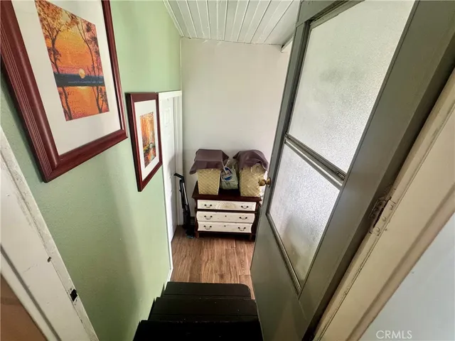 a view of stairs and furniture