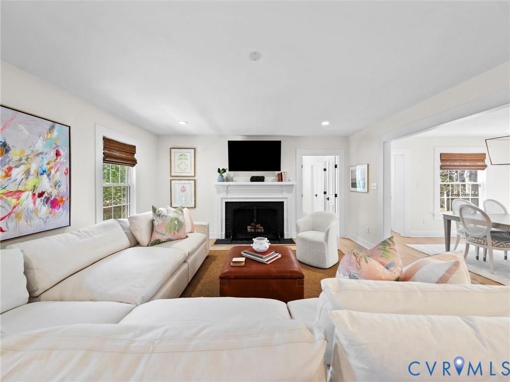 200 North Ridge Road Henrico, VA 23229 - Photo 13 of 85 a living room with furniture a fireplace and a flat screen tv