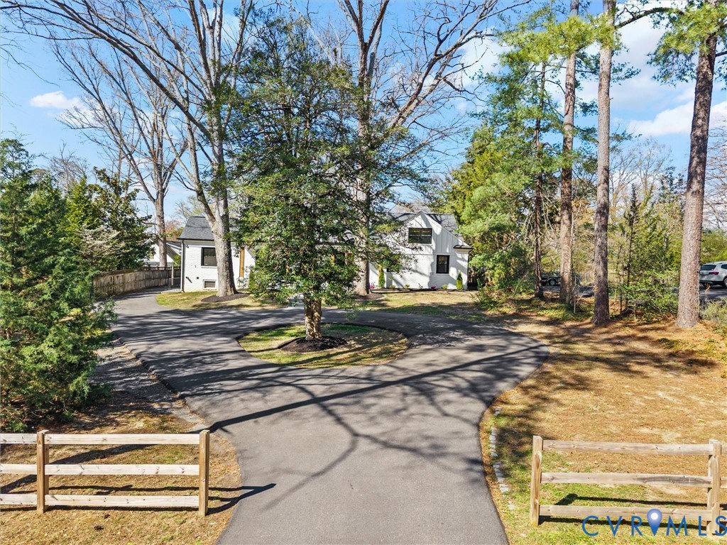 200 North Ridge Road Henrico, VA 23229 - Photo 2 of 85 a view of a yard with plants and trees