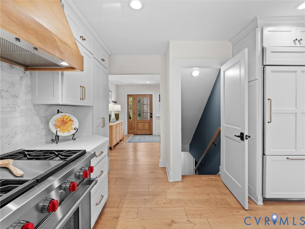 200 North Ridge Road Henrico, VA 23229 - Photo 30 of 85 a kitchen with stainless steel appliances granite countertop a stove and a sink