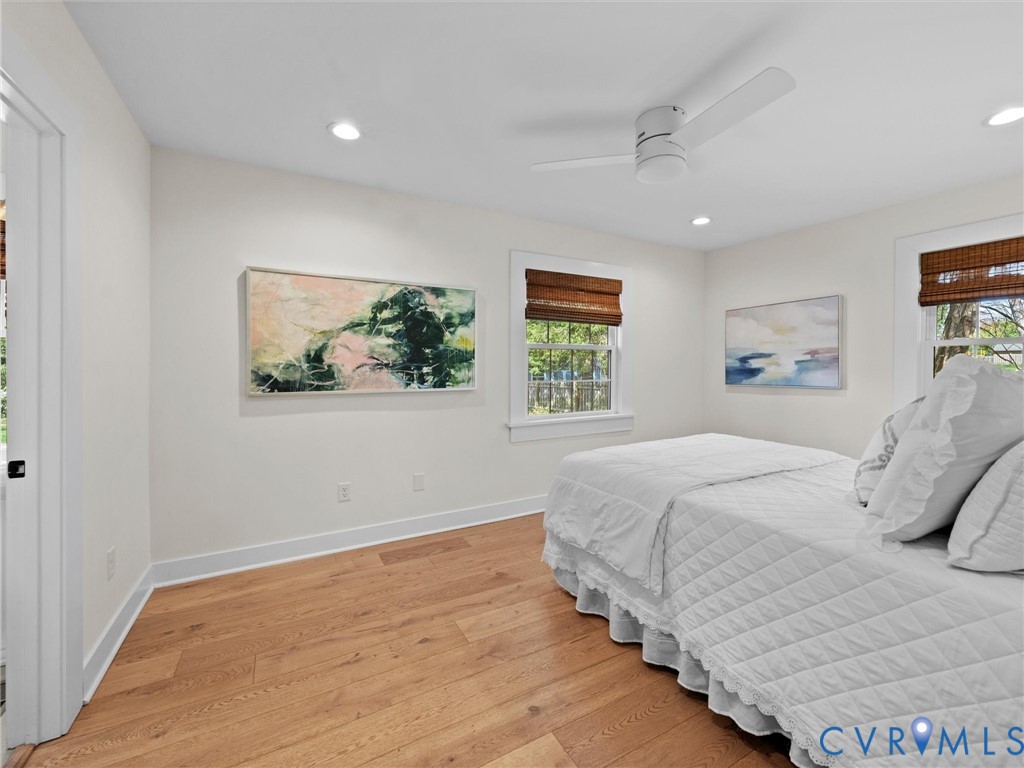 200 North Ridge Road Henrico, VA 23229 - Photo 47 of 85 a bedroom with a large bed and a window