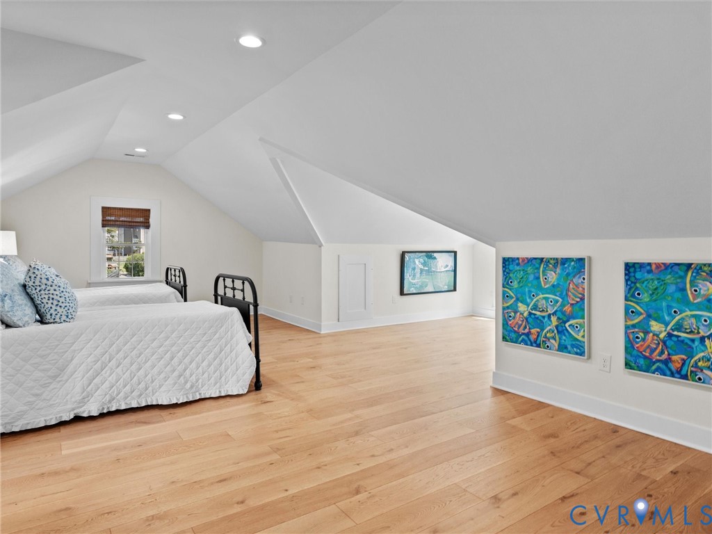200 North Ridge Road Henrico, VA 23229 - Photo 55 of 85 a spacious bedroom with a bed and painting on the wall