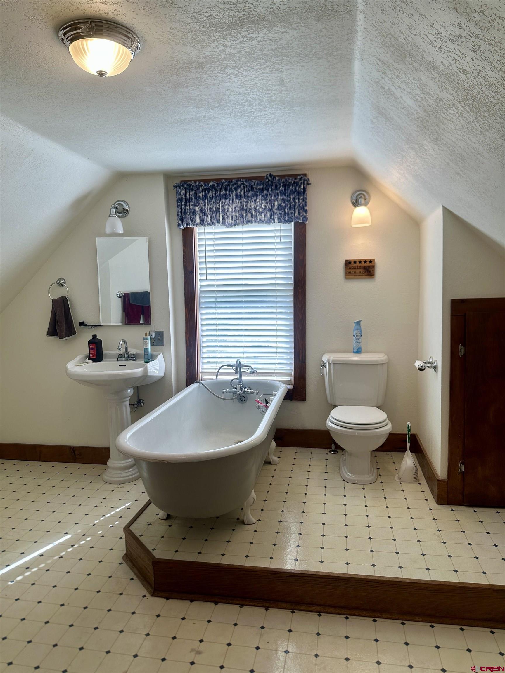 2468 1500th Road Delta, CO 81416 - Photo 20 of 45 a bathroom with a sink toilet and mirror