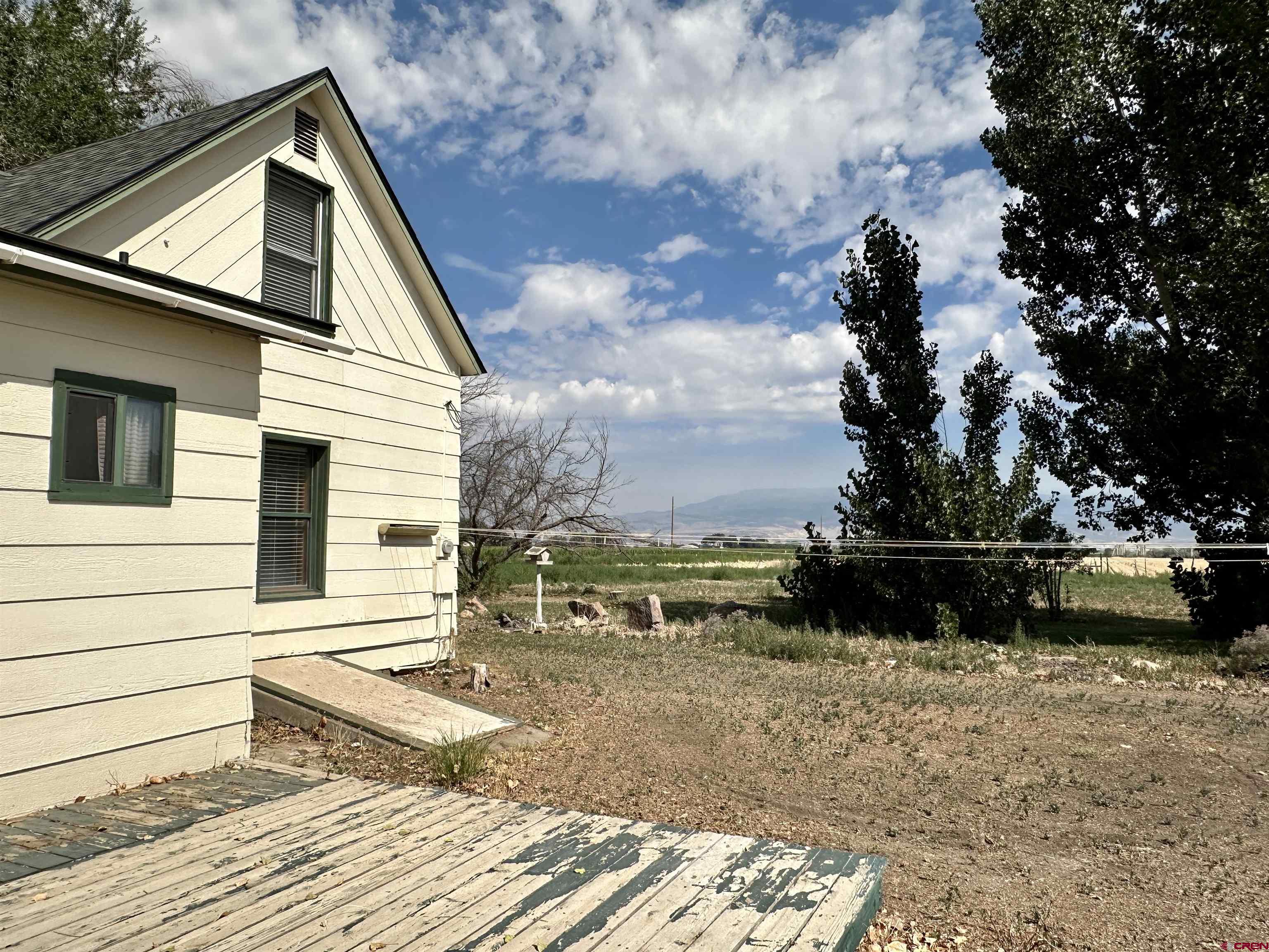 2468 1500th Road Delta, CO 81416 - Photo 25 of 45 a view of a house with a yard