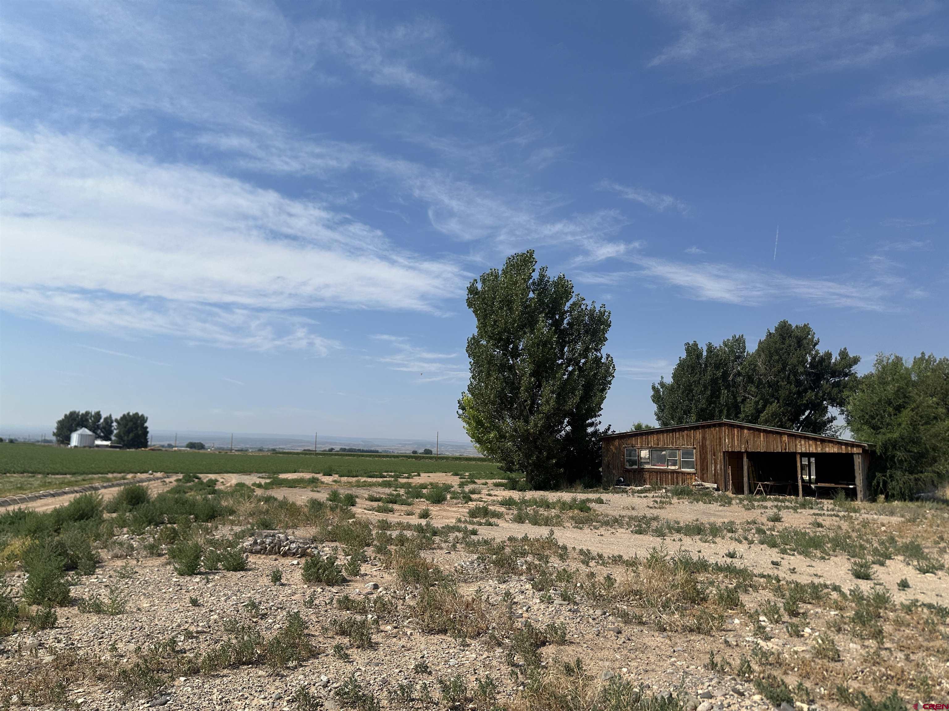 2468 1500th Road Delta, CO 81416 - Photo 31 of 45 a front view of a house with a yard