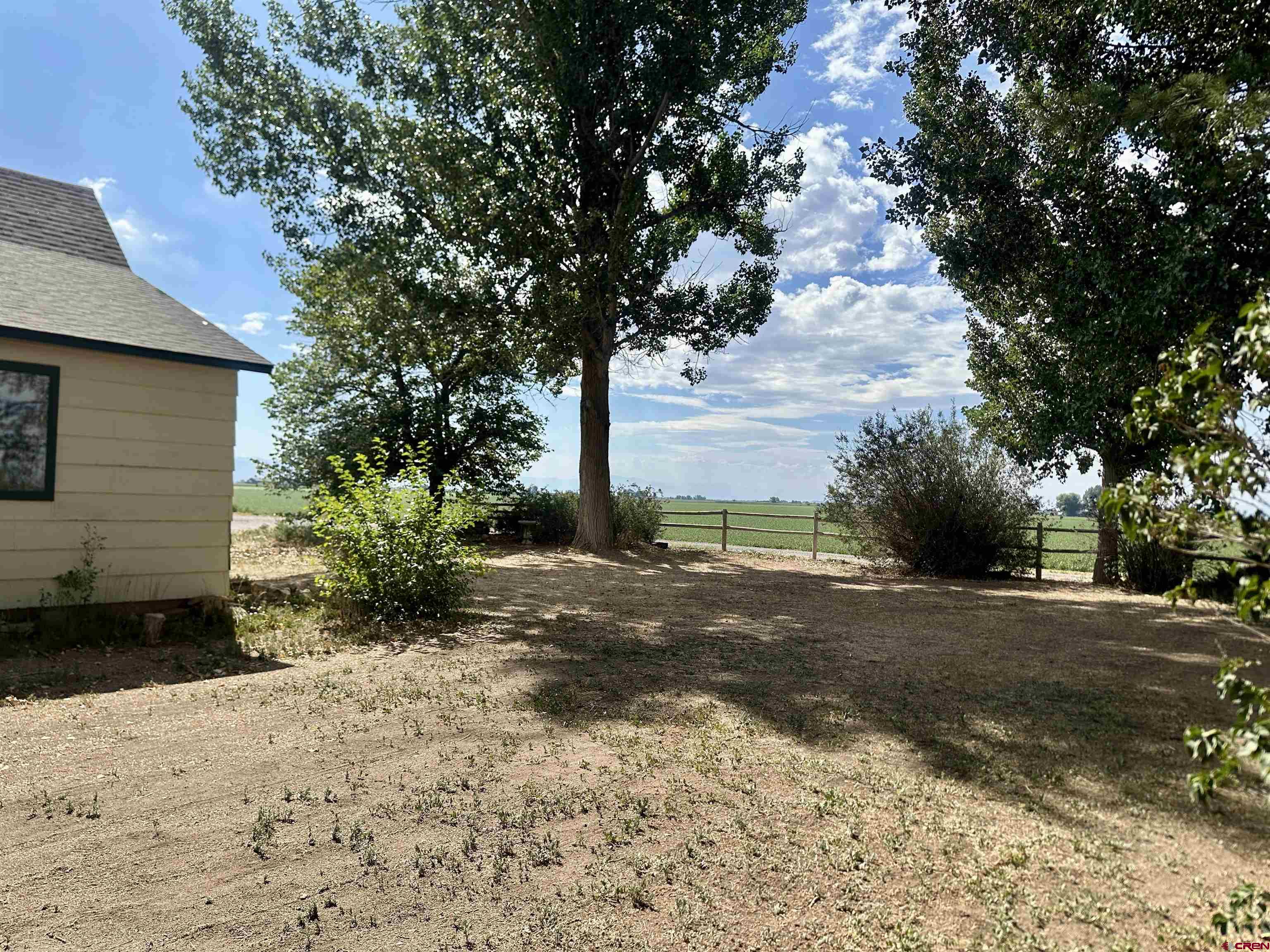 2468 1500th Road Delta, CO 81416 - Photo 36 of 45 a front view of a house with a yard