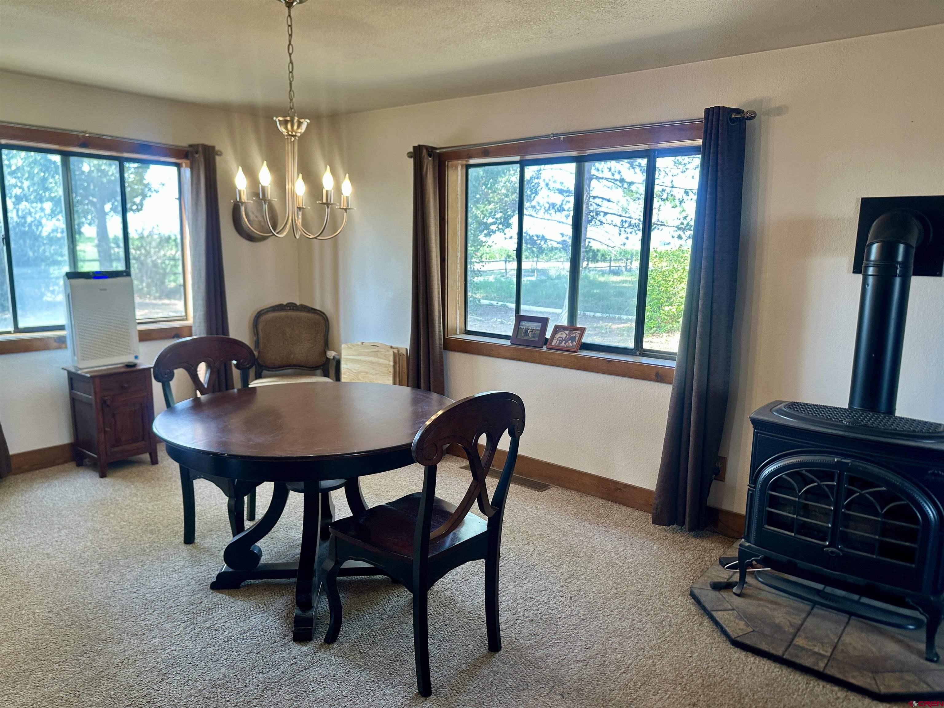 2468 1500th Road Delta, CO 81416 - Photo 5 of 45 a view of a dining room with furniture window and outside view