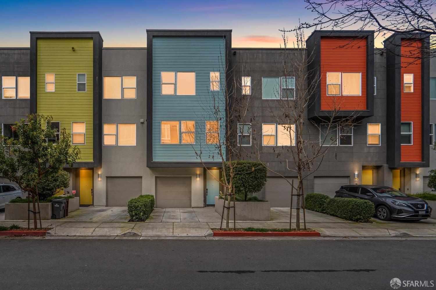 1353 Pullman Way Oakland, CA 94607 - Photo 4 of 55 a front view of a building with a garden and plants