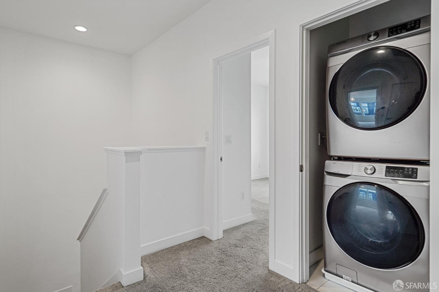 1353 Pullman Way Oakland, CA 94607 - Photo 47 of 55 a view of a hallway with washer and dryer