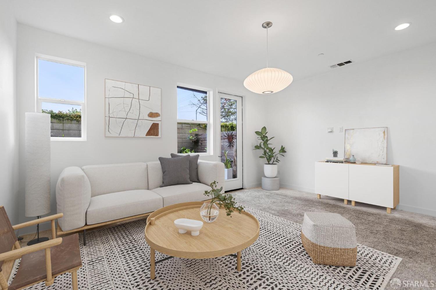 1353 Pullman Way Oakland, CA 94607 - Photo 6 of 55 a living room with furniture and a large window