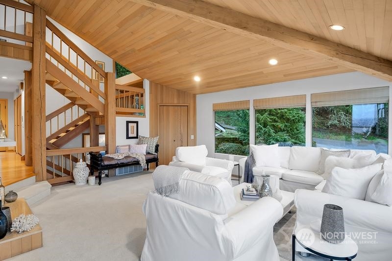 8045 West Mercer Way Mercer Island, WA 98040 - Photo 12 of 38 a living room with furniture and a large window