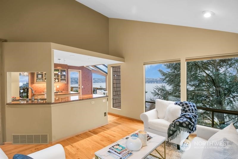 8045 West Mercer Way Mercer Island, WA 98040 - Photo 24 of 38 a living room with furniture and large windows
