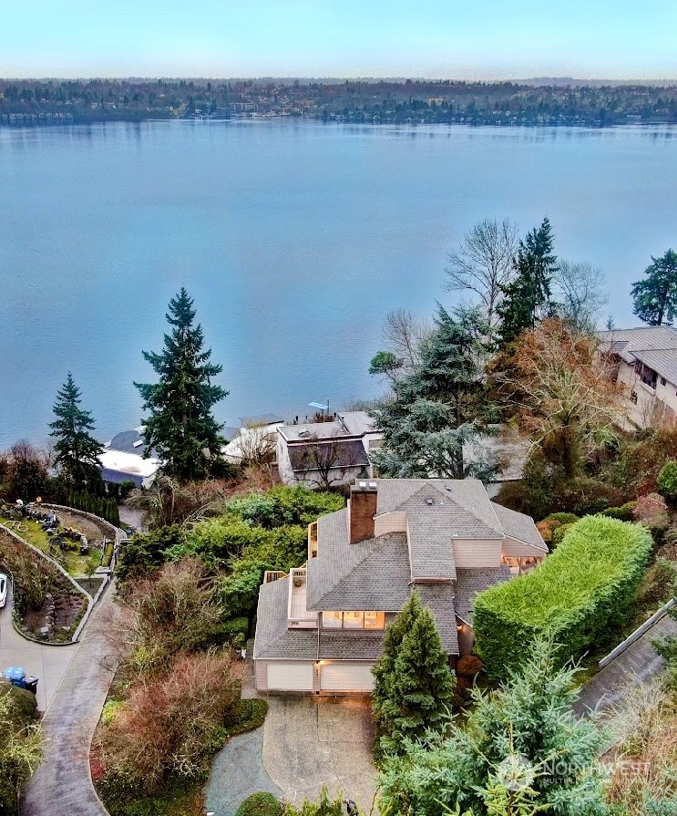 8045 West Mercer Way Mercer Island, WA 98040 - Photo 3 of 38 an aerial view of a house with a lake view