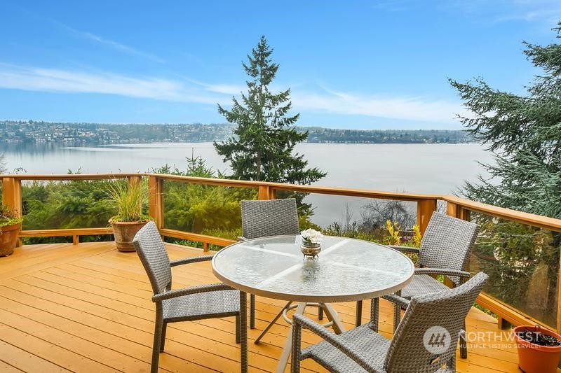 8045 West Mercer Way Mercer Island, WA 98040 - Photo 32 of 38 a view of a chairs and table on the wooden floor