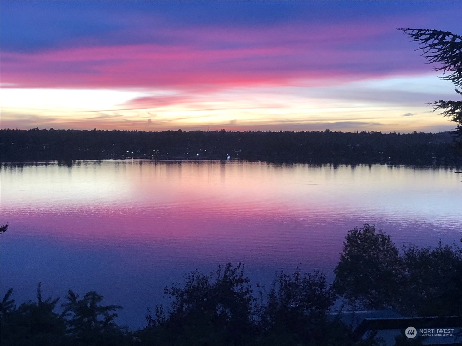 8045 West Mercer Way Mercer Island, WA 98040 - Photo 36 of 38 a view of lake with sunset