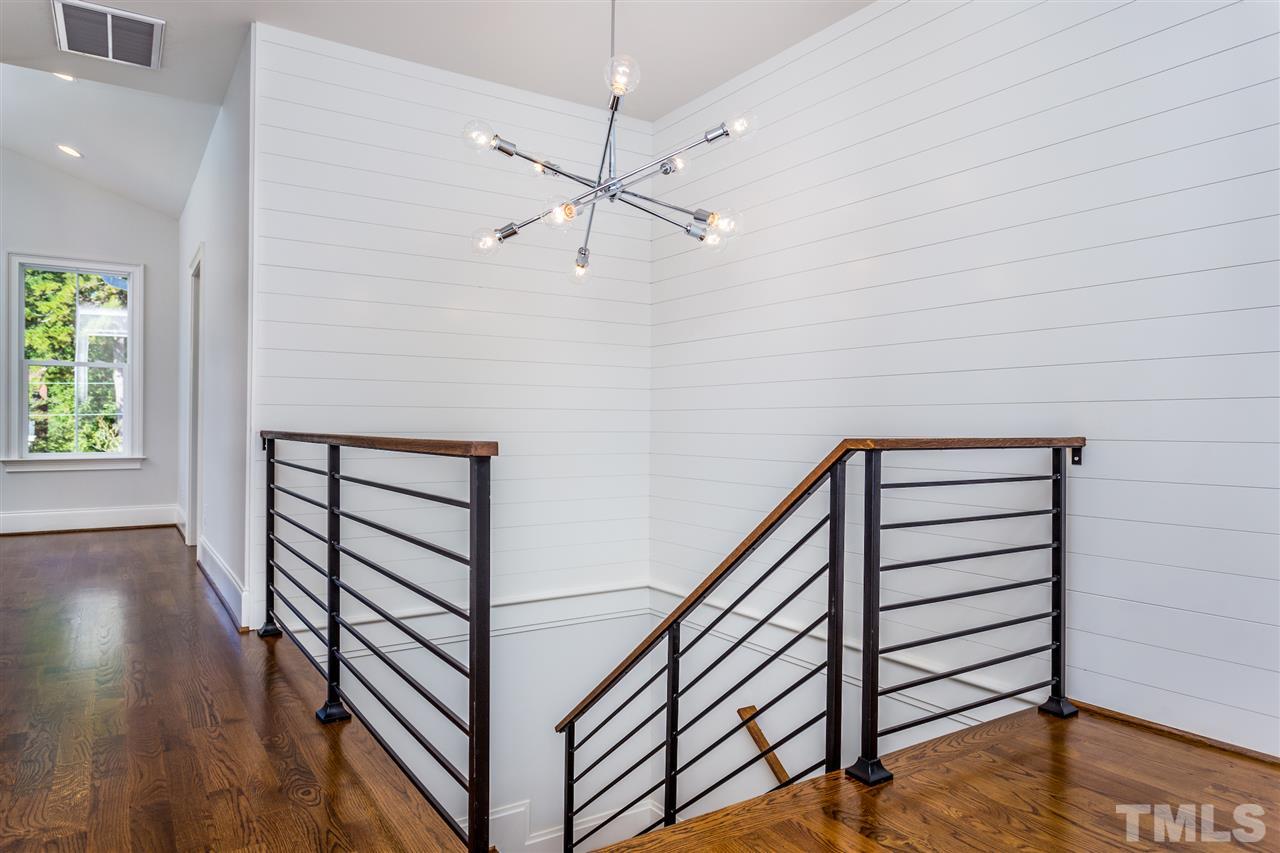 3203.5 Clark Avenue Raleigh, NC 27607 - Photo 17 of 25 a view of a hallway with stairs