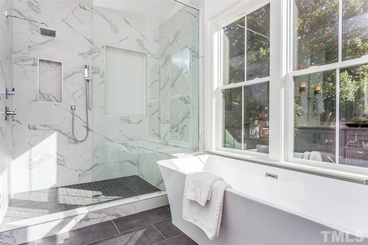 3203.5 Clark Avenue Raleigh, NC 27607 - Photo 19 of 25 a bathroom with a tub and a shower