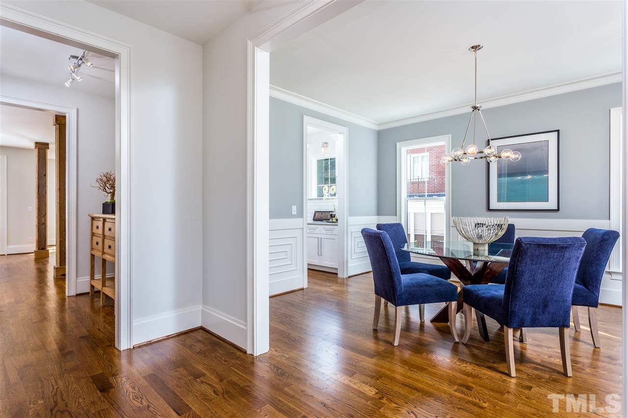 3203.5 Clark Avenue Raleigh, NC 27607 - Photo 3 of 25 a view of a a dining room with furniture window and wooden floor