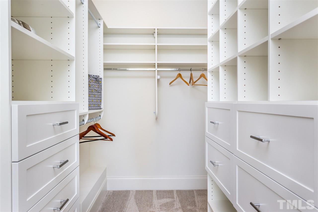 3203.5 Clark Avenue Raleigh, NC 27607 - Photo 21 of 25 a view of walk in closet with empty racks