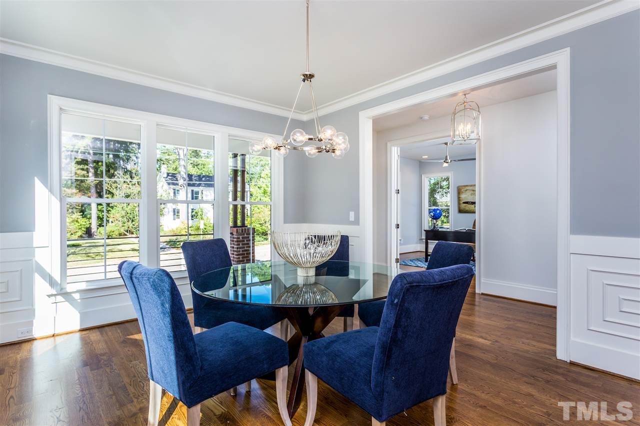 3203.5 Clark Avenue Raleigh, NC 27607 - Photo 4 of 25 a view of a dining room with furniture window and wooden floor