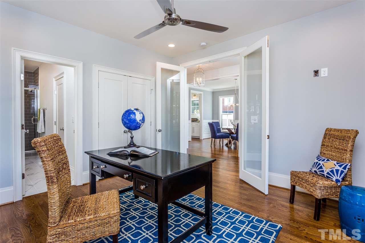 3203.5 Clark Avenue Raleigh, NC 27607 - Photo 5 of 25 a living room with furniture and wooden floor