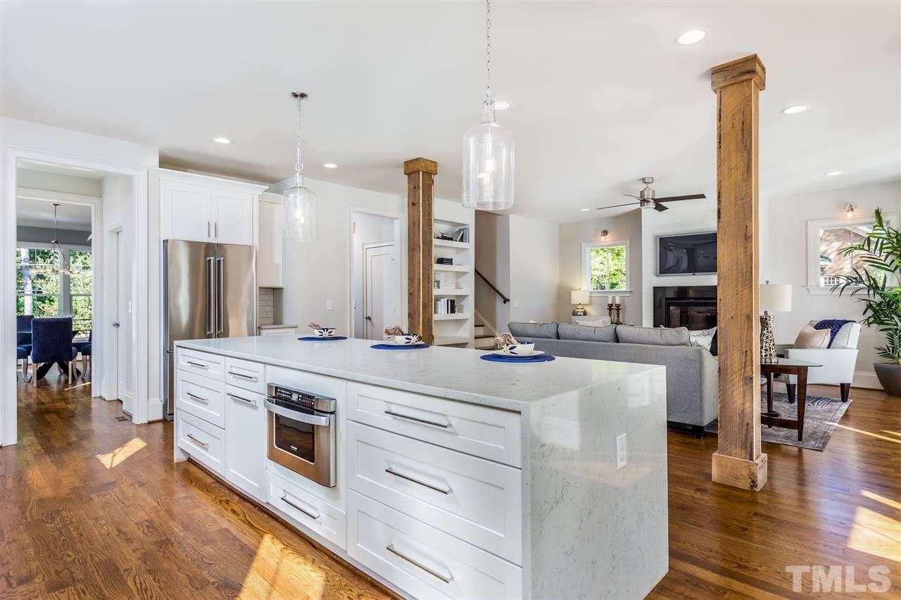 3203.5 Clark Avenue Raleigh, NC 27607 - Photo 10 of 25 an open kitchen with a sink and living room view