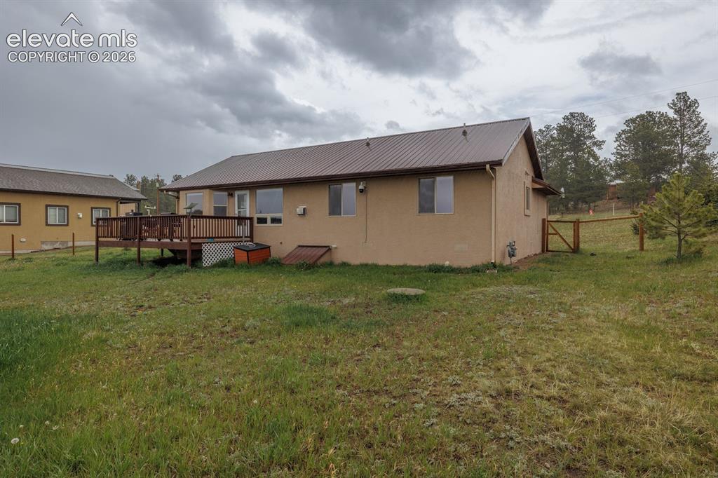 471 Due S Road Florissant, CO 80816 - Photo 7 of 35 a house view with a garden space