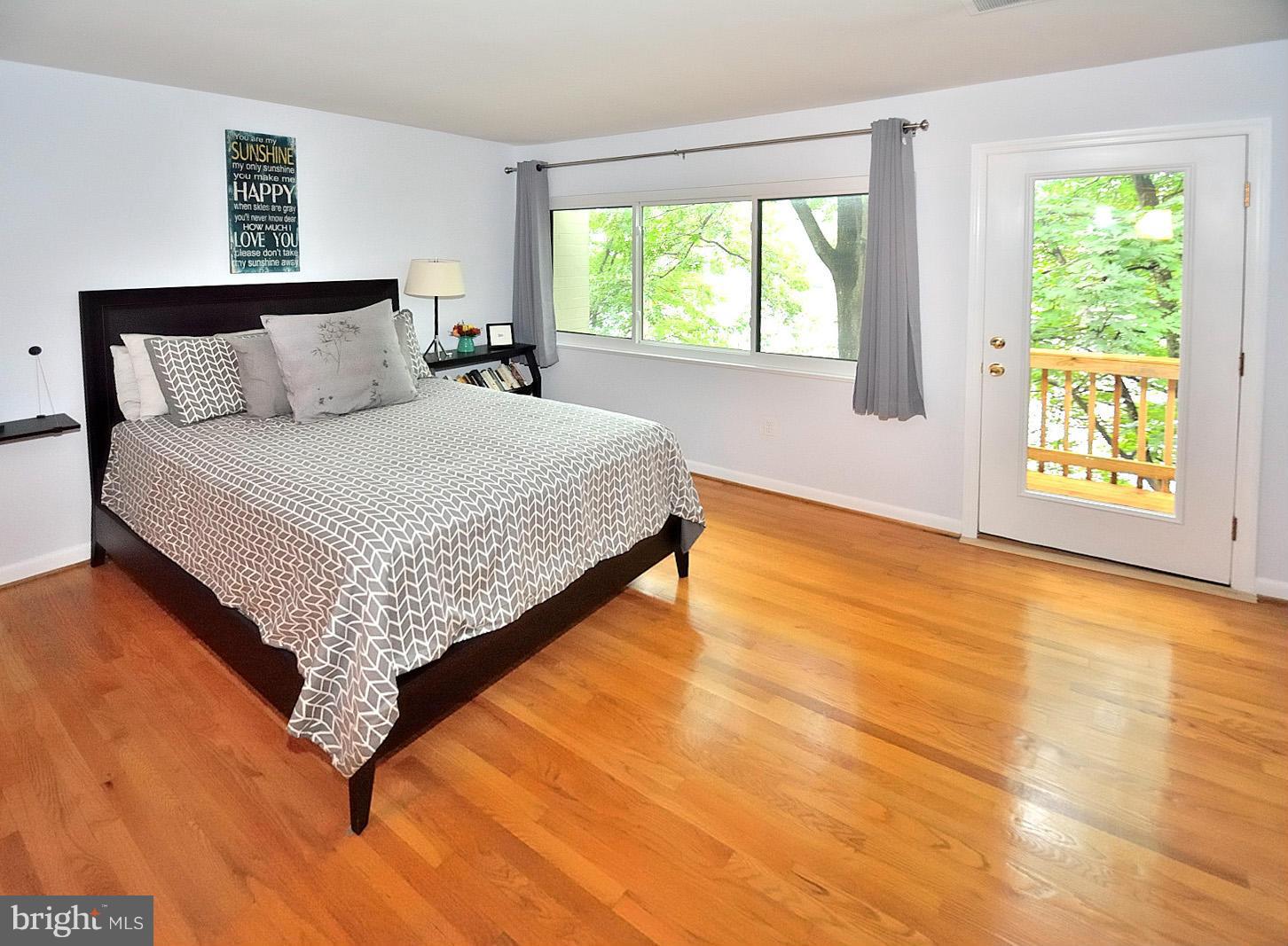 1608 Waters Edge Lane Reston, VA 20190 - Photo 13 of 27 a bedroom with a bed and window