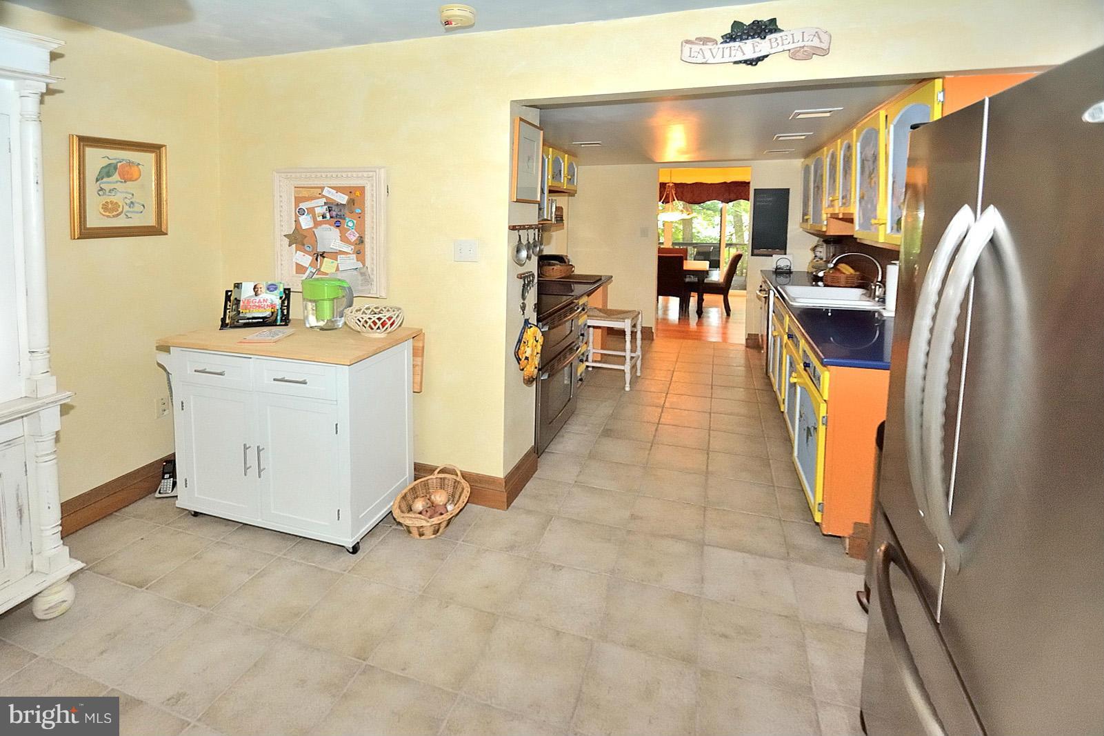 1608 Waters Edge Lane Reston, VA 20190 - Photo 20 of 27 a view of a kitchen with furniture and a kitchen