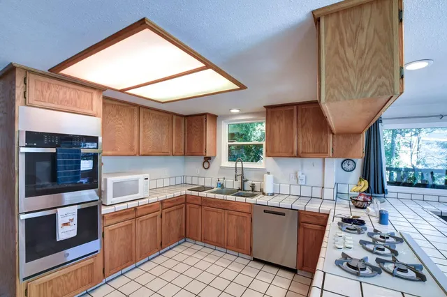 a view of living room with furniture and window
