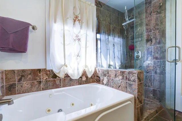 a view of a dinning table and chairs in patio