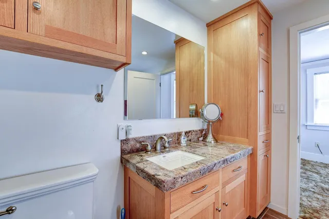 a patio with a table and chairs