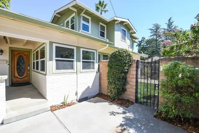 a view of a house with a garden