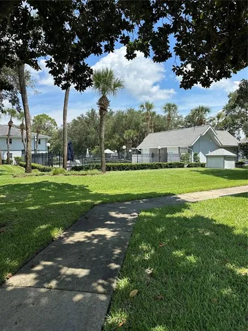 a view of a house with a big yard