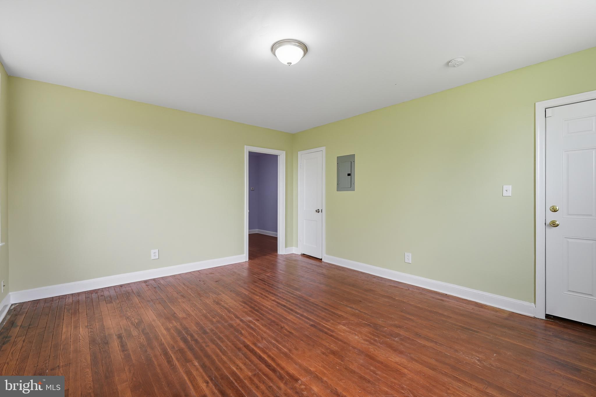 3919 R Street Southeast, Unit 2 Washington, DC 20020 - Photo 12 of 41 a view of an empty room with wooden floor