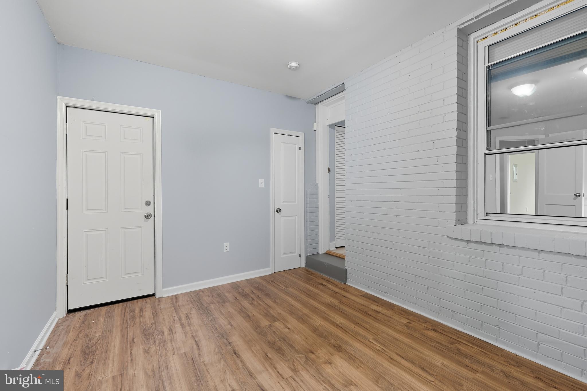 3919 R Street Southeast, Unit 2 Washington, DC 20020 - Photo 15 of 41 a view of a room with wooden floor and bathroom