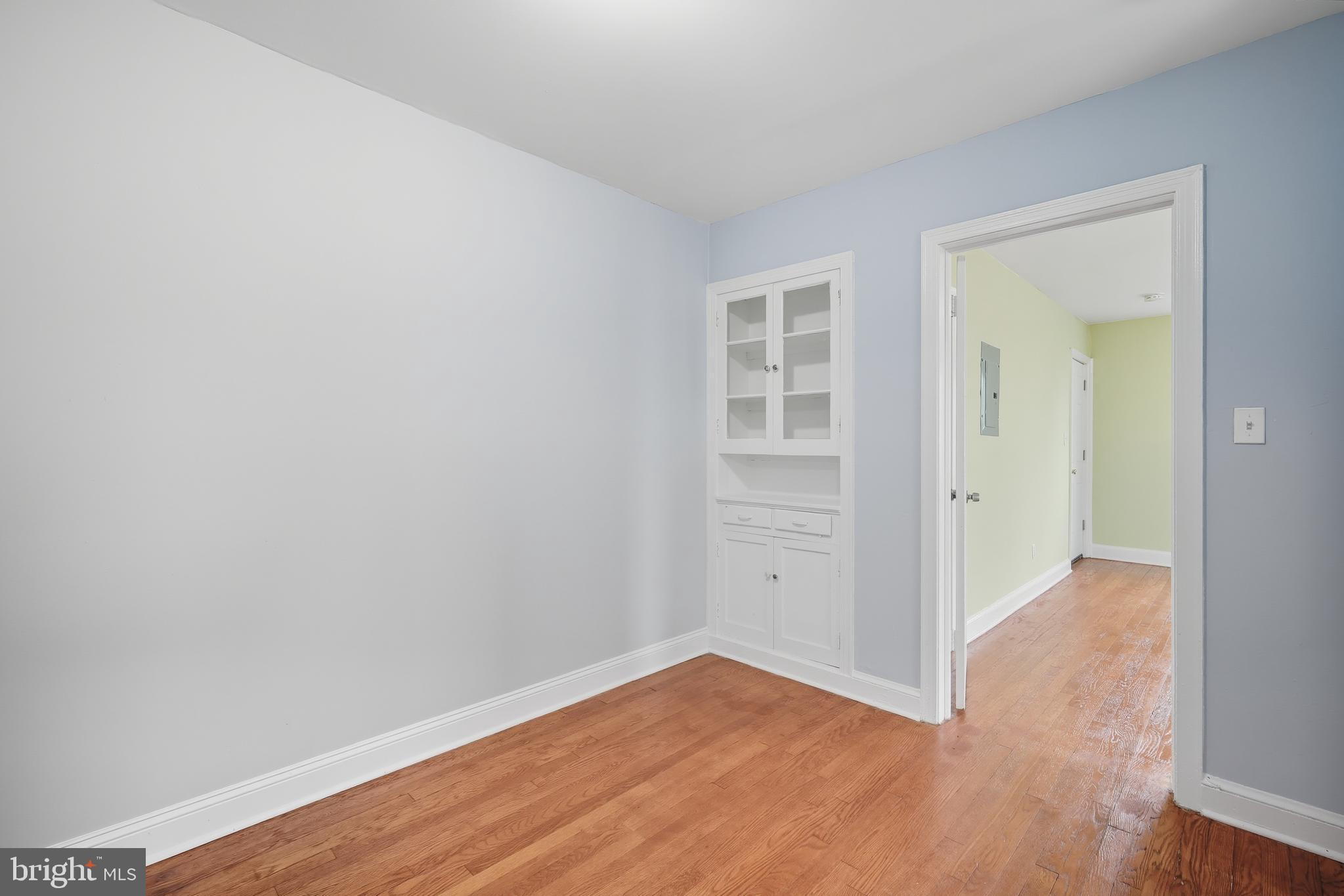 3919 R Street Southeast, Unit 2 Washington, DC 20020 - Photo 31 of 41 wooden floor in an empty room