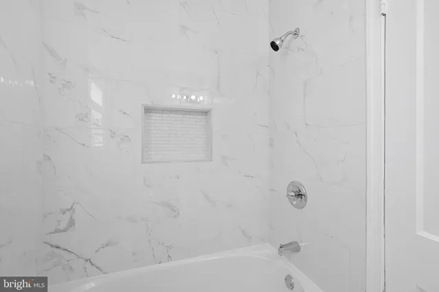 a bathroom with a bathtub