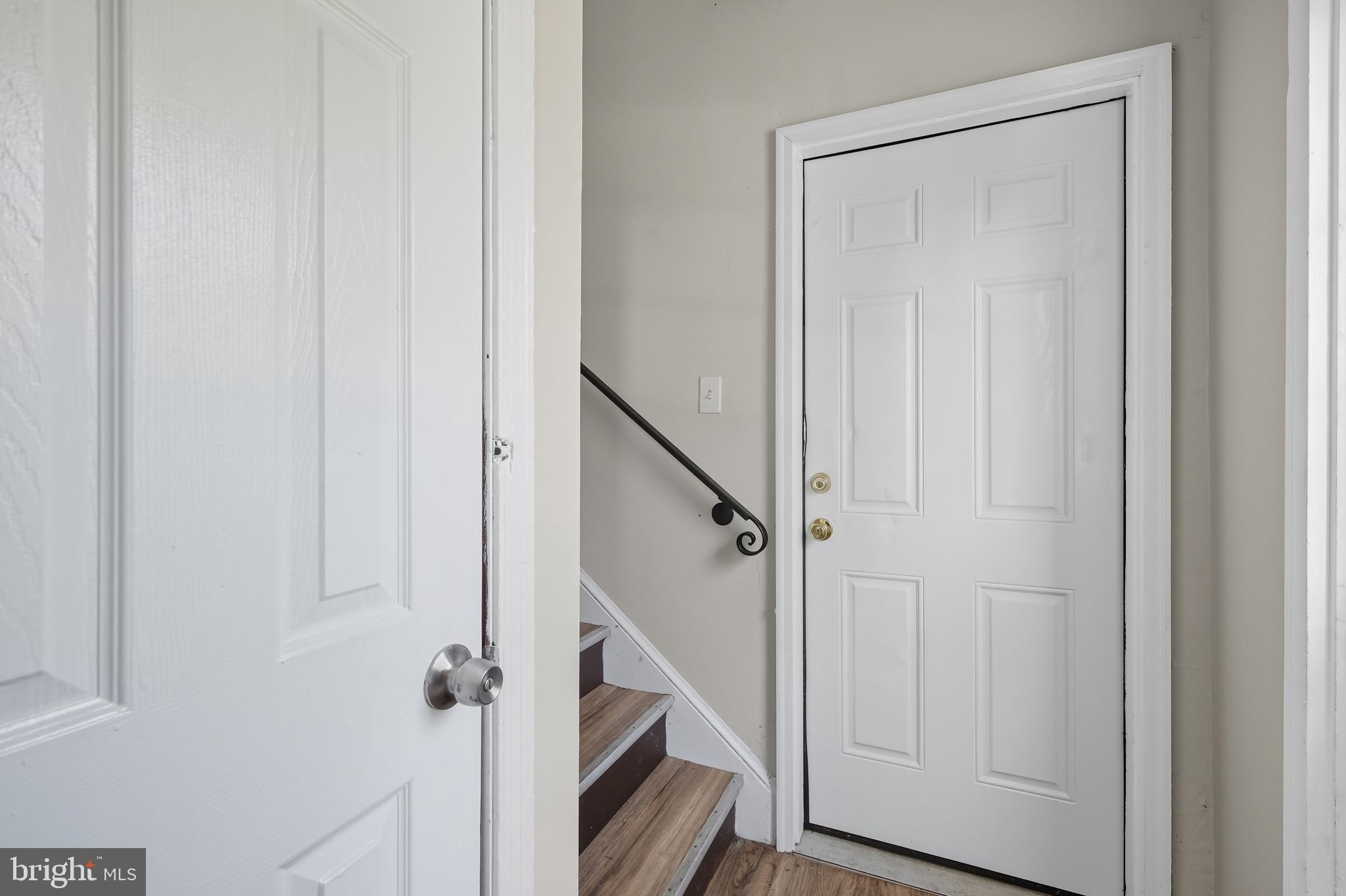 3919 R Street Southeast, Unit 2 Washington, DC 20020 - Photo 38 of 41 a view of a hallway with wooden floor and entryway