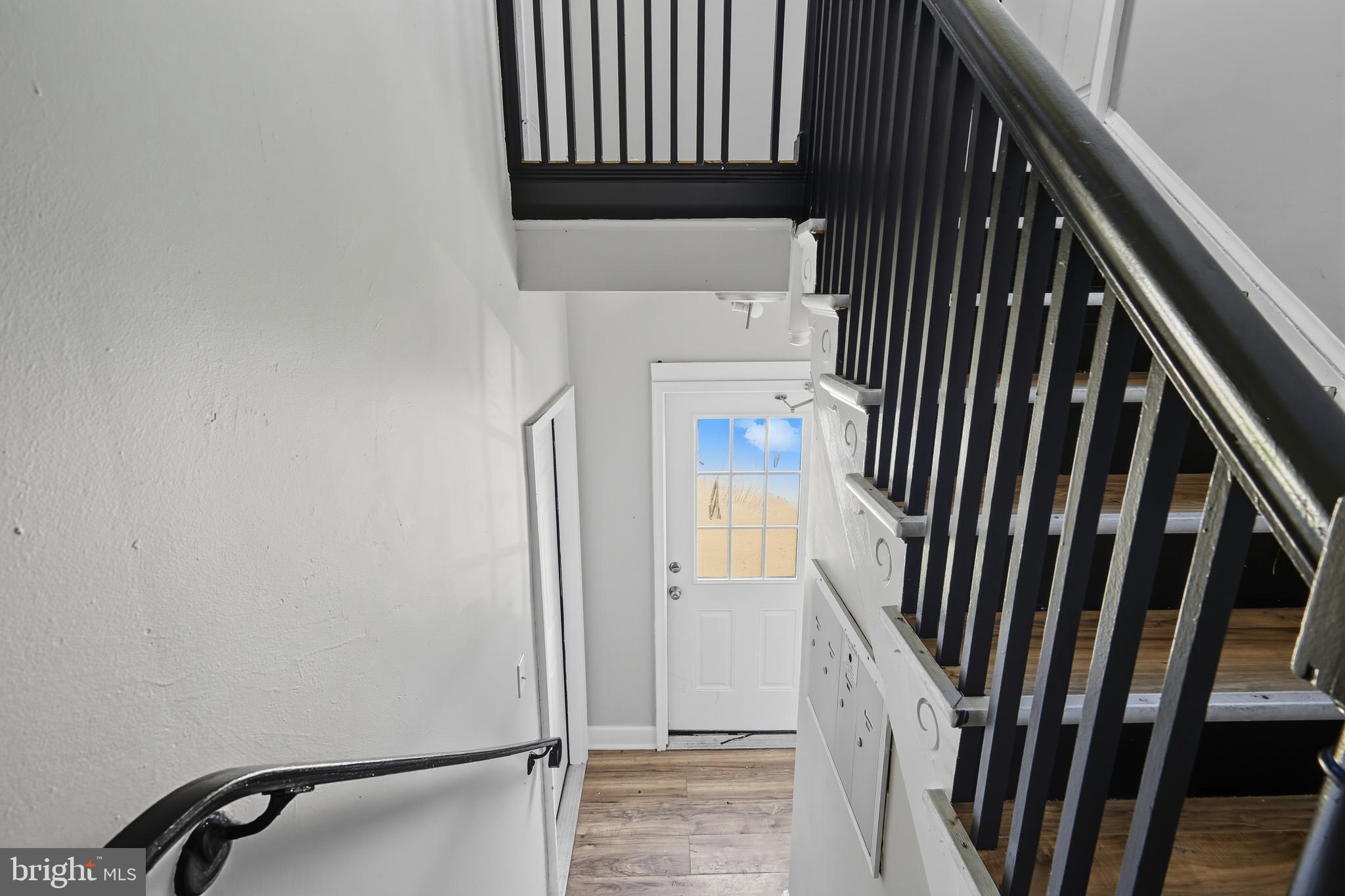 3919 R Street Southeast, Unit 2 Washington, DC 20020 - Photo 41 of 41 a view of staircase with railing and white walls