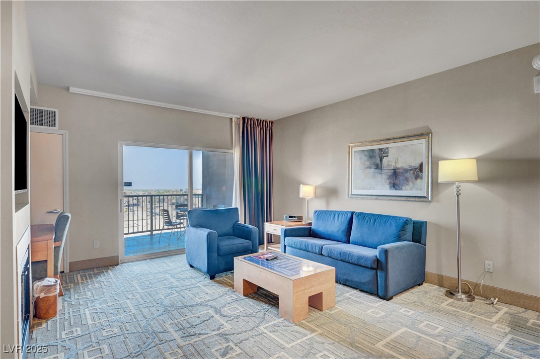 211 East Flamingo Road, Unit 1211 Las Vegas, NV 89169 - Photo 5 of 22 Living Area with sliding door to Terrace