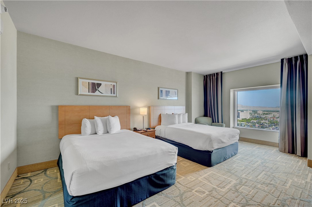 211 East Flamingo Road, Unit 1211 Las Vegas, NV 89169 - Photo 8 of 22 Bedroom with 2 comfortable Queen Beds