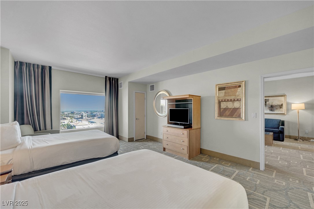 211 East Flamingo Road, Unit 1211 Las Vegas, NV 89169 - Photo 10 of 22 Bedroom with a view