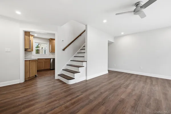 a view of entryway with wooden floor