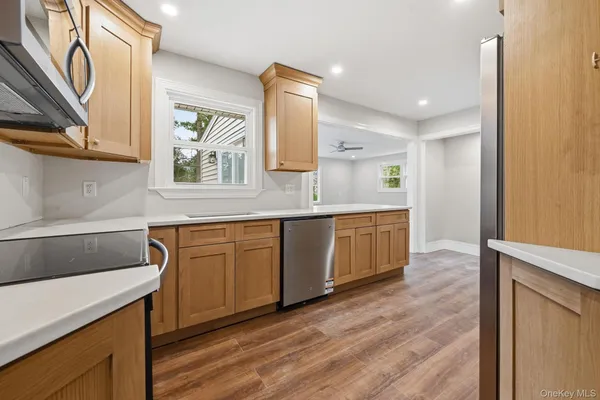 a spacious bathroom with a double vanity sink and a mirror
