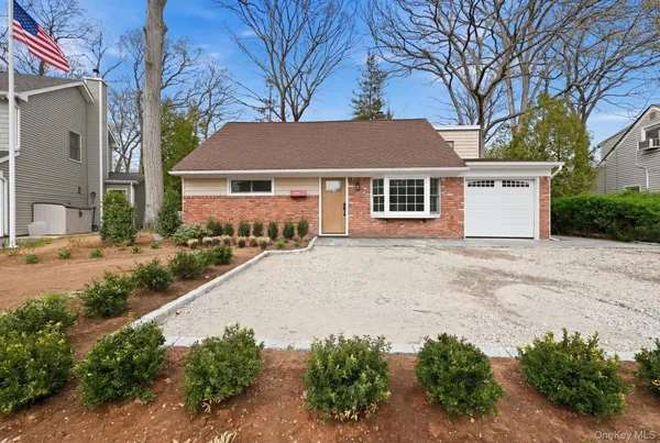 front view of a house with a pathway