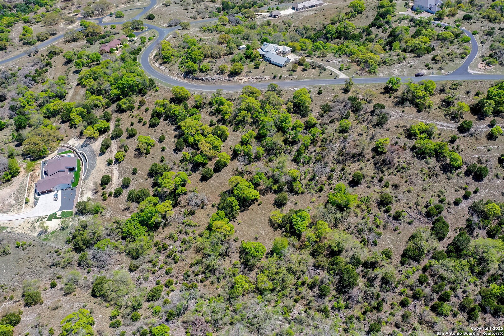 331 Echo Falls Road Comfort, TX 78013 - Photo 2 of 15 an aerial view of a house with a yard