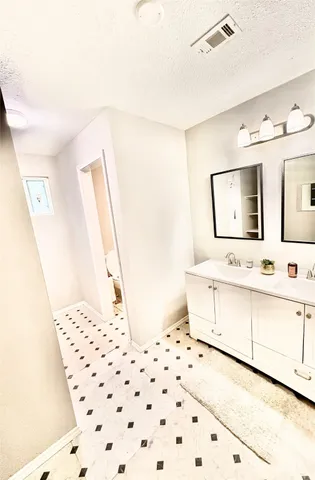 a bathroom with a shower and a toilet