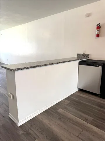 a view of a back yard of the house and an outdoor space